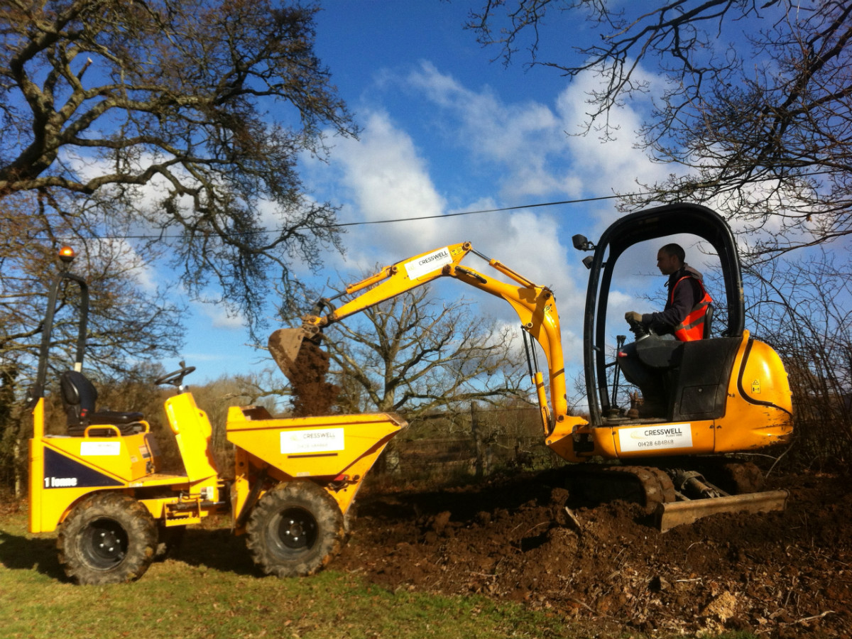 Digger loading dumper